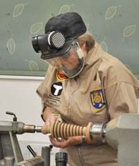 Sanding the candlestick