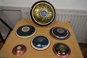 Turned wooden shields