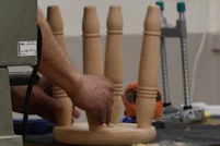Fitting legs to a stool