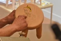 Pyrographed character
