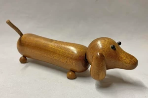Hand turned wooden sausage dog